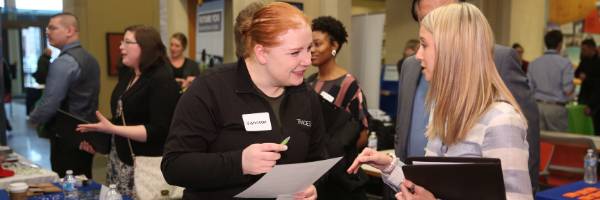 two women talking to each other